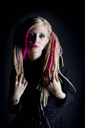 portrait of young woman with dreadlocksの写真素材