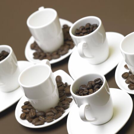 cups with coffee beansの写真素材