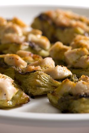 baked chicken meat with pesto on puffの写真素材