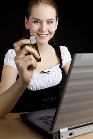 businesswoman with a notebook and boxing gloveの写真素材