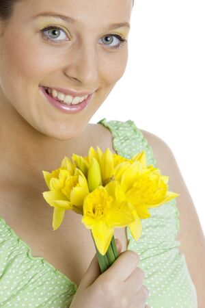 portrait of woman with daffodilsの写真素材