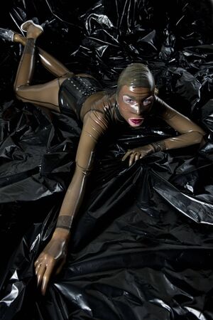 woman wearing latex clothesの写真素材