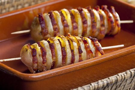 potato skewers with baconの写真素材