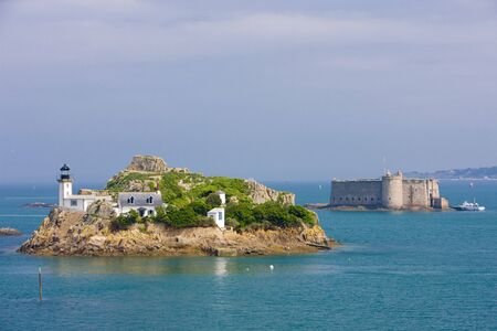 lighthouse and Chateau du Taureau, Pointe de Pen al Lann, Brittany, Franceの写真素材