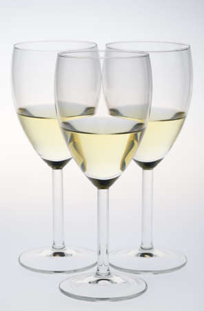 wineglasses with white wineの写真素材