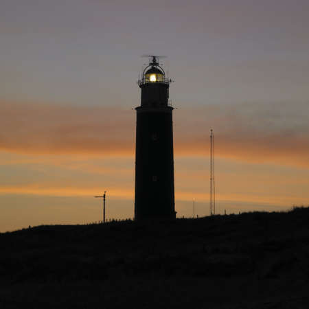 lighthouse at daybreak, De Cocksdorp, Texel Island, Netherlandsの写真素材