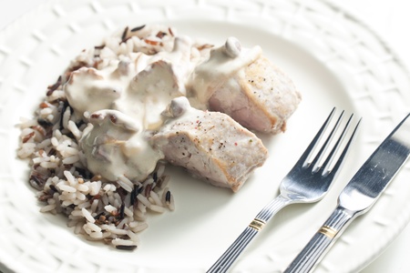 pork tenderloin with mushrooms and creamy sauceの写真素材
