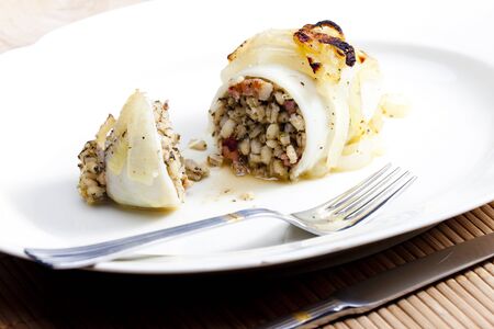 sepia filled with pearl barley baked with onionの写真素材