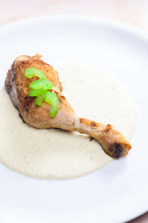 chicken leg with celery sauceの写真素材