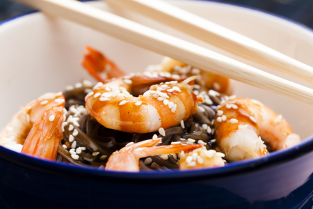 Japanese buckwheat noodles with prawns, soya sauce and sesameの写真素材