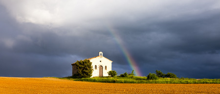 chapel with rainbow, Plateau de Valensole, Provence, Franceの写真素材