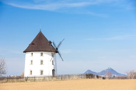 windmill near Mseno and Bezdez Castle at background, Czech Republicのeditorial素材