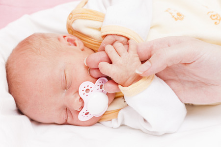 portrait of sleeping newborn baby girlの写真素材