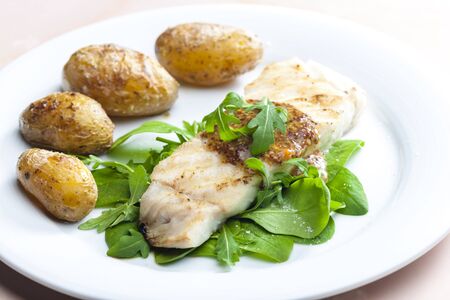 Still lifepikeperch with spinach and potatoesの写真素材