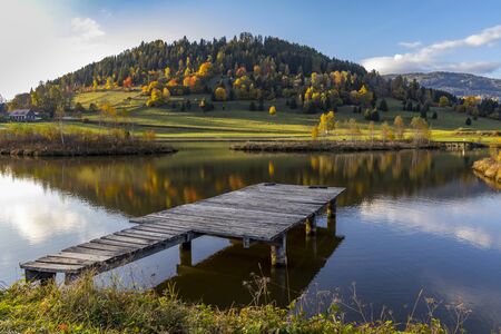 autumn pond under the mountains, Murau district,
Styria, Austriaの写真素材