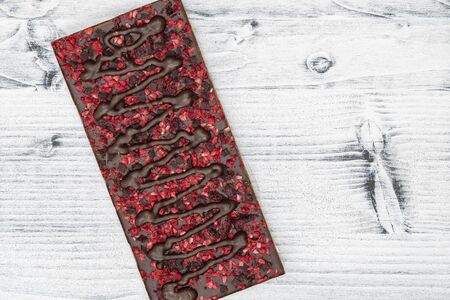 still life of chocolate with different kind dried fruit