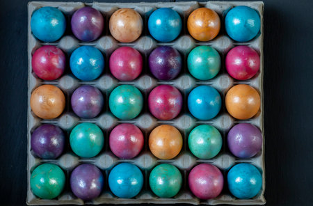 Easter background with hand painted purple, blue, green, orangeの写真素材