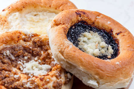 pies stuffed with poppy, curd and nuts filling