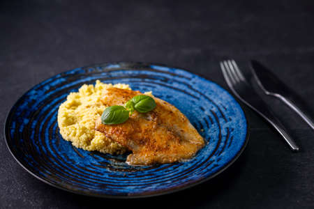 spicy fillet of white cod with couscousの写真素材