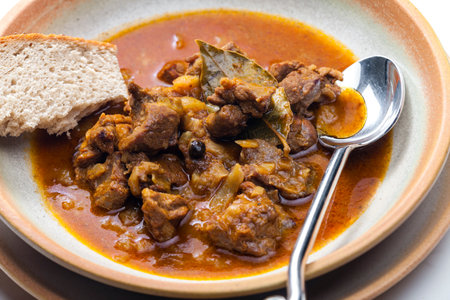 Czech beef goulash served with breadの写真素材