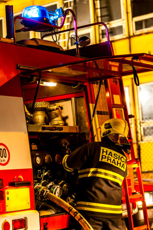 fireman during extinguishing of the fire
