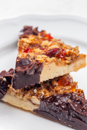 cookies with candies, nuts and chocolateの写真素材