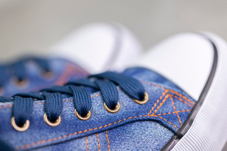 close up of denÃ­m sneakers