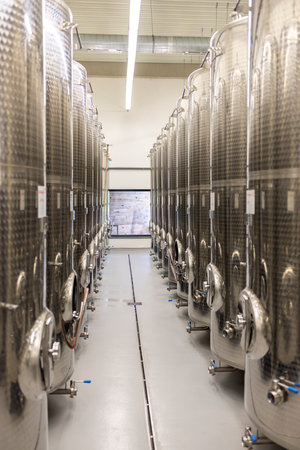 Modern production wine cellar with stainless steel tank, Southern Moravia, Czech Republic
