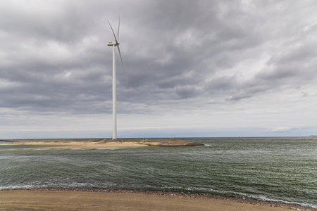 Wind turbines on edge of  national park Oosterschelde, Domburg - Vrouwenpolder, The Netherlandsの写真素材