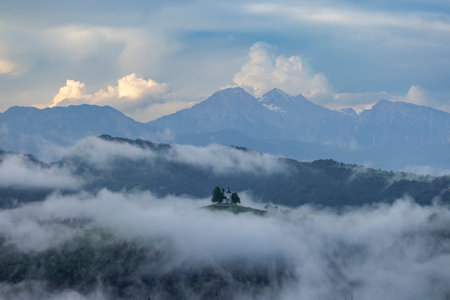 Landscape with St. Thomas Church (Cerkev Sveti Tomaz) near Skofja Loka, Sloveniaの写真素材