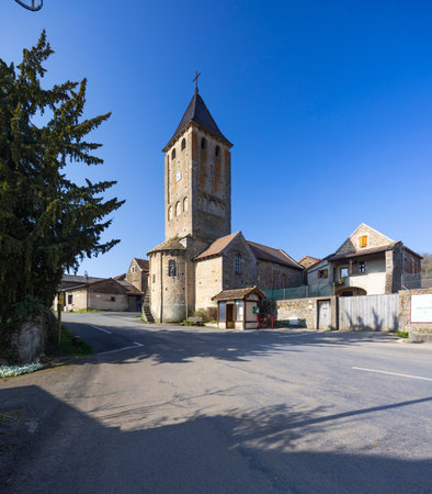 Medieval church of Saint Nazaire standing tall in Donzy le Pertuis, Saone et Loire, Bourgogne Franche Comte, Franceの写真素材