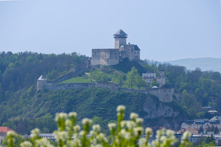 Trencin Castle in Slovakia, a historical landmark dominating the city skyline on a spring day