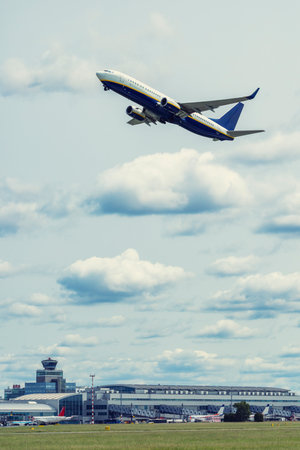 Passenger airplane taking off over Vaclav Havel Airport Prague, Hostivice, Czechiaの写真素材
