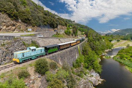 Mastrou, a tourist train running along the Doux river in the Doux Gorges, Ardeche, Franceの写真素材