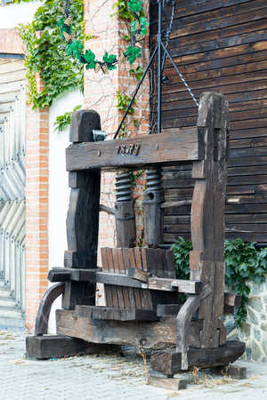 Traditional wooden wine press in Dolany, Slovakia, showcasing the region's viticultural heritageの写真素材