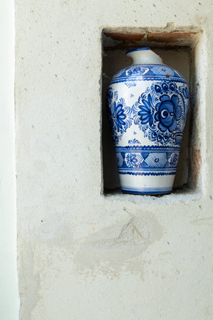 Decorative majolica vase in a niche in the wall, showcasing Slovak folk art in Modra, Bratislavsky krajの写真素材
