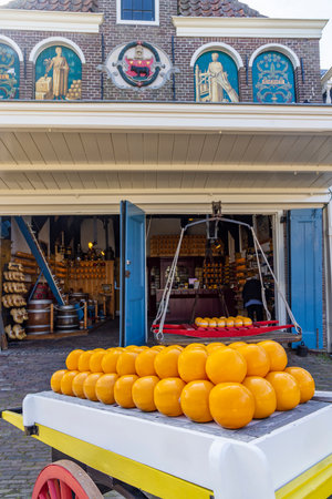 Dutch cheese wheels on display in a traditional cheese market in Edam, North Holland, Netherlandsの写真素材