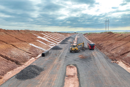 Construction workers building new highway in Czechia near Dekov, Stredocesky krajの写真素材