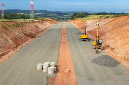 Excavators working on a new highway construction site in Czechia, Stredocesky krajの写真素材