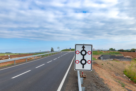 Road sign indicating directions on a rural highway in Czechiaの写真素材