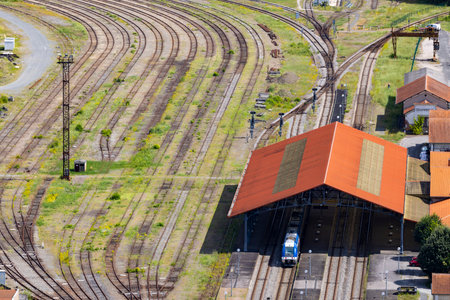 Expansive rail yard with trains and tracks in Capdenac, France