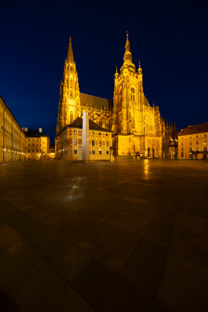 St. Vitus Cathedral glowing in the evening darknessの写真素材