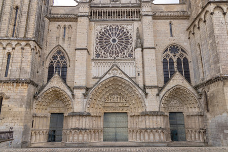 Detailed view of the ornate facade of Poitiers Cathedral in Franceの写真素材