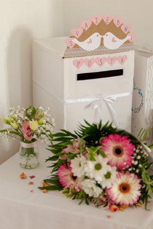 Elegant wedding card box with flowers and delicate decorationの写真素材