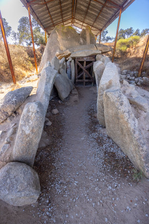Anta Grande do Zambujeiro dolmen showing corridor and chamber under protective cover in Evora, Portugalの写真素材
