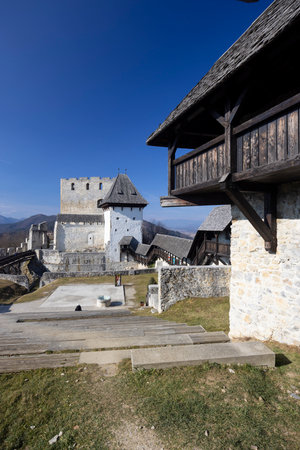 Medieval Celje Castle with wooden walkway and towers rising above the surrounding landscape in Celje, Sloveniaの写真素材