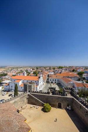 Scenic aerial view of Beja cityscape with its historic castle, church and traditional architecture, bathed in sunlightの写真素材