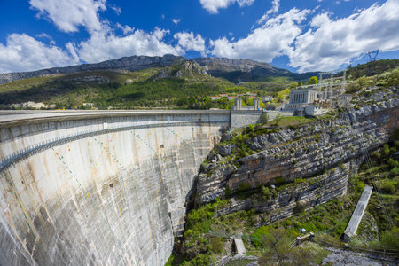 The impressive Castillon Barrage stands tall in the Verdon Gorge, Castellane, a testament to engineering and a source of hydroelectric powerの写真素材