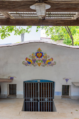 Wine cellar entrance with colorful folk painting in South Moravian Region, Czech Republic, representing local traditionsの写真素材