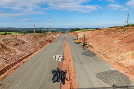 Construction site of a highway in Czechia, near Dekov, with excavators and construction materialsの写真素材